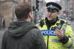 policeman talking to a person